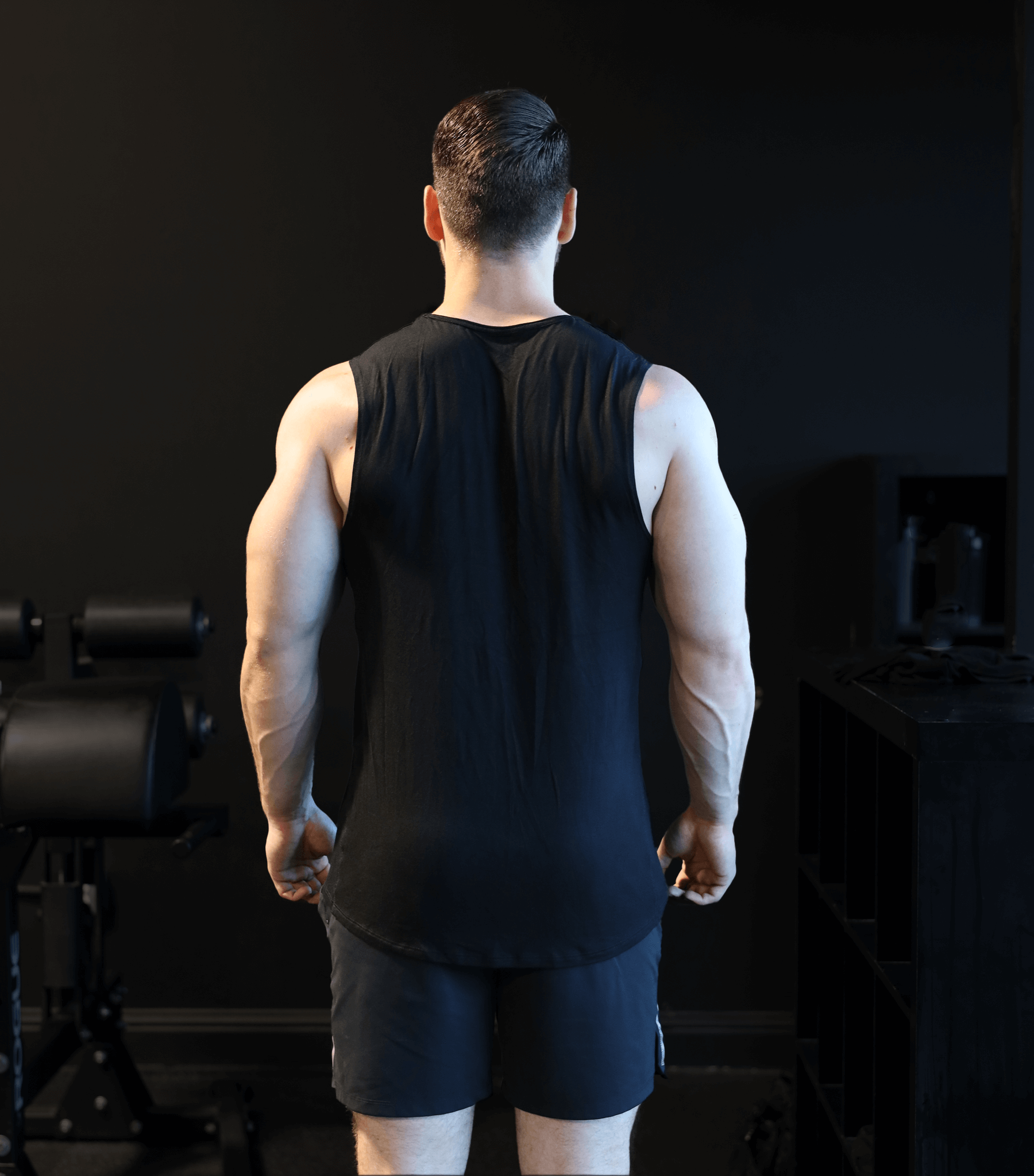 Bamtech Bamboo Aerotech Tank - A black tank top made from sustainable bamboo fabric, featuring a sleek and comfortable design. The tank offers breathability and moisture-wicking properties for optimal performance during workouts. The bamboo fabric provide