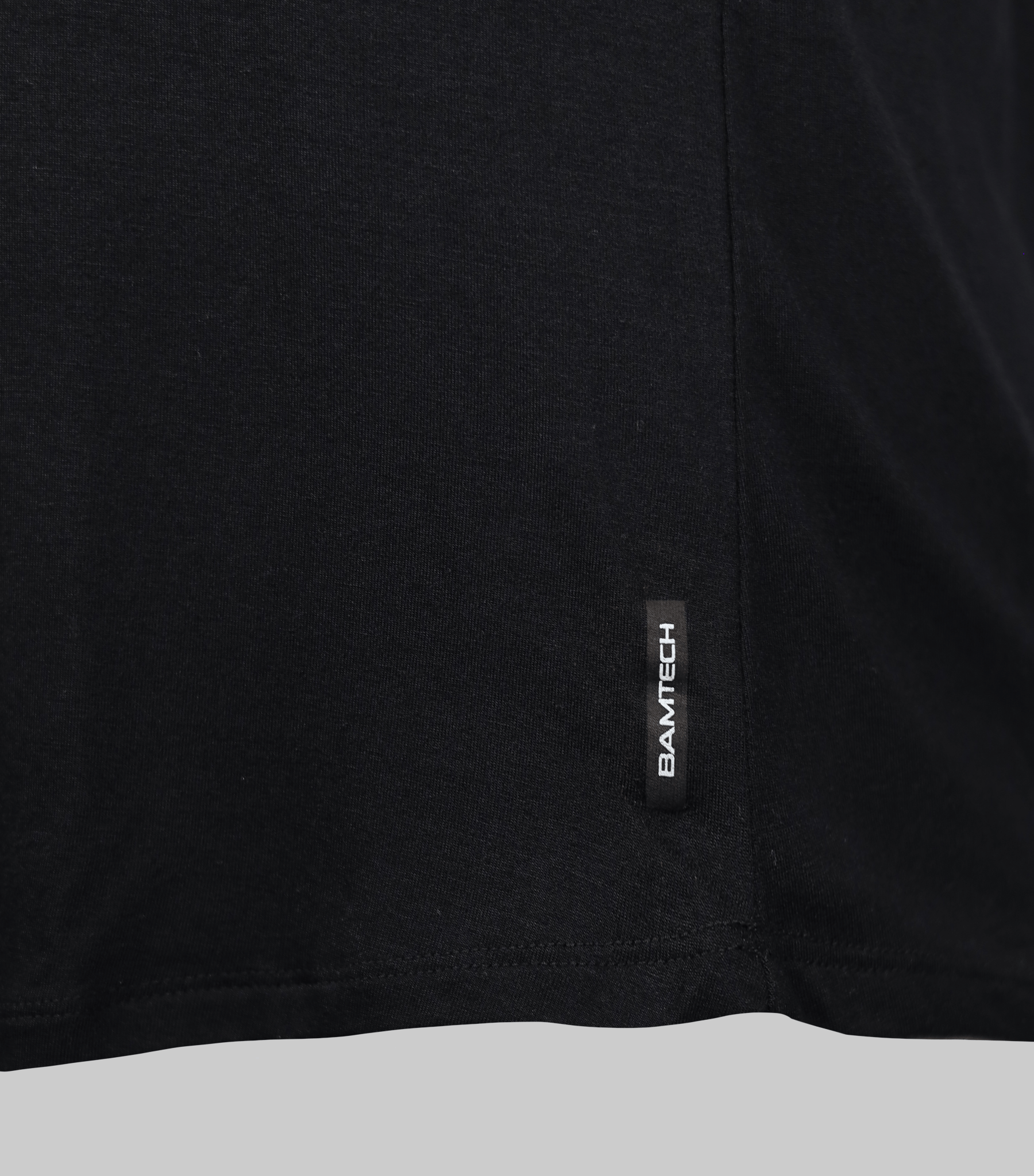 Bamtech Bamboo Aerotech Tank - A black tank top made from sustainable bamboo fabric, featuring a sleek and comfortable design. The tank offers breathability and moisture-wicking properties for optimal performance during workouts. The bamboo fabric provide